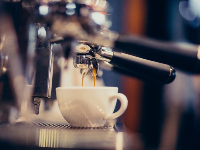 Coffee machine making coffee at a bar