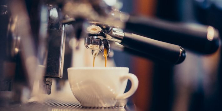 Coffee machine making coffee at a bar