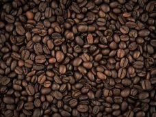 Coffee beans closeup background ( Filtered image processed vintage effect. )