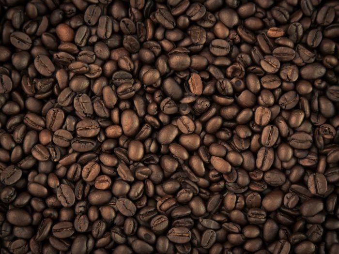 Coffee beans closeup background ( Filtered image processed vintage effect. )